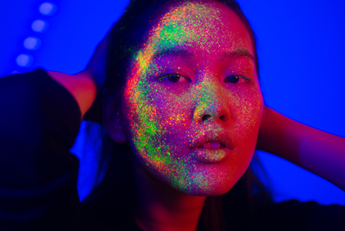 Frosted cool-tone makeup and graphic eyes — Y3K futuristic beauty trend 2026