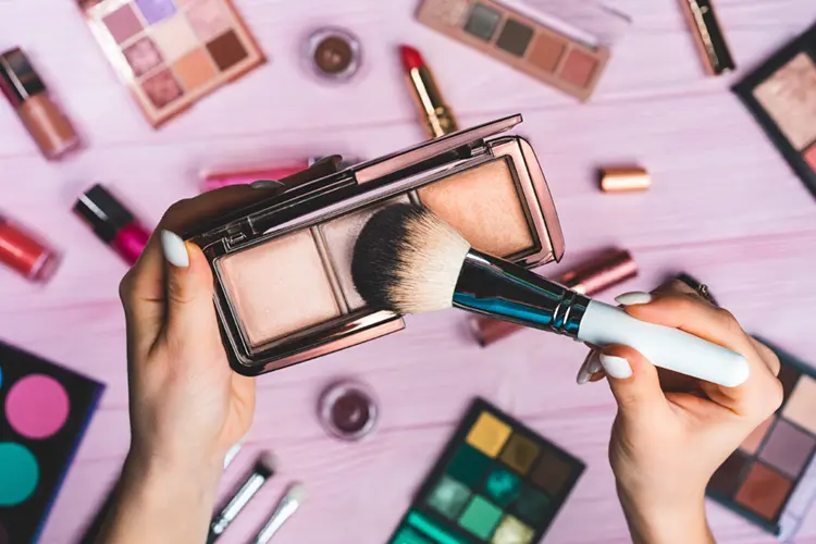 Makeup products on shelves — microplastic regulatory gap