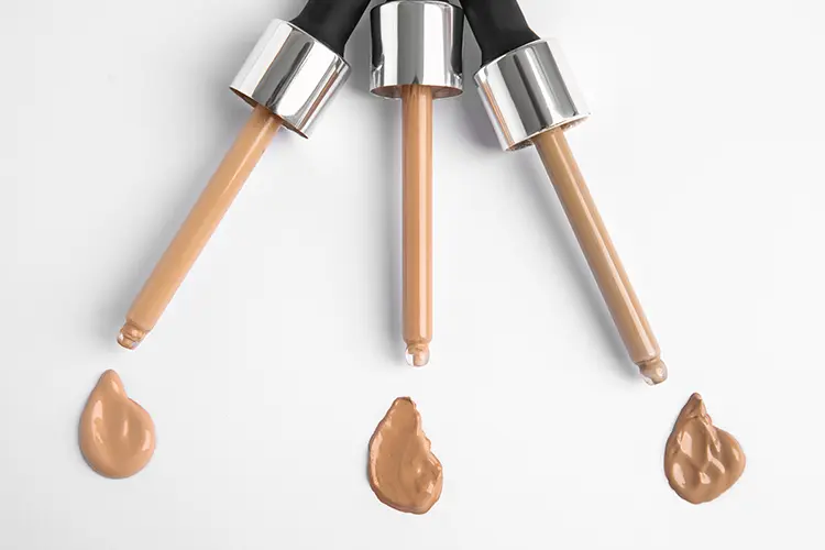 Clean concealer products for mature skin — flat lay